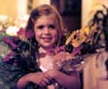 Young Erica star with a bouquet of flowers