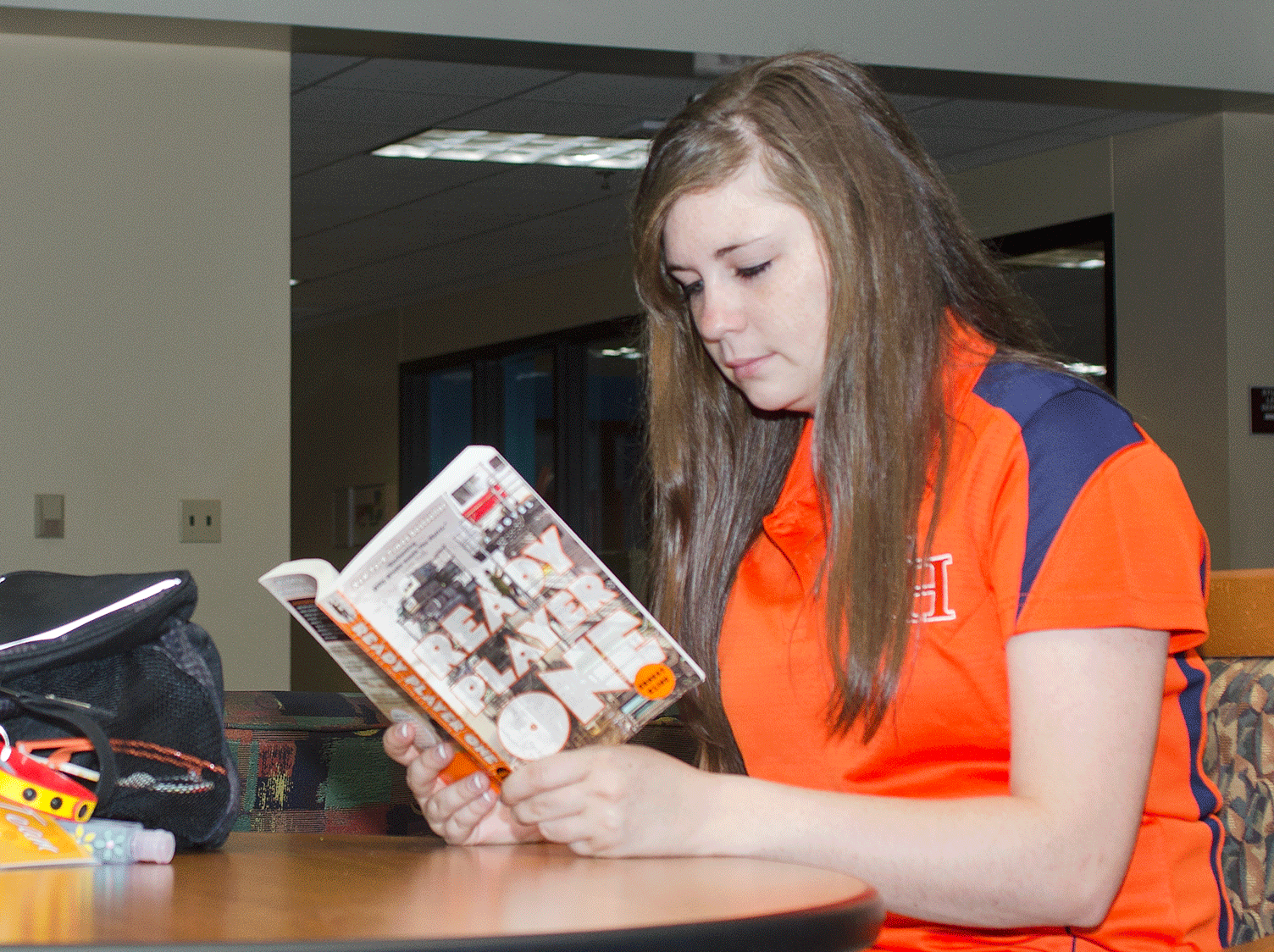 Students reading Ready Player one