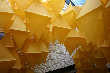Close up of geometric hanging paper objects