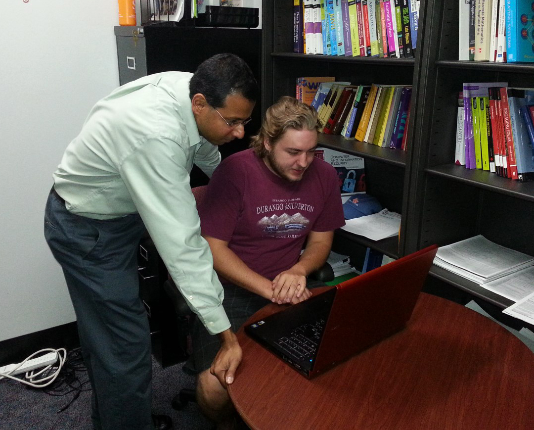 Narasimha Shashidhar and Dylan Novak researching digital forensics