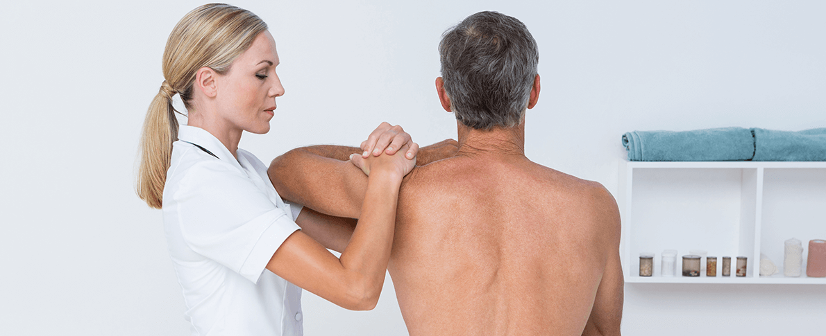 Therapist working on a patient's back