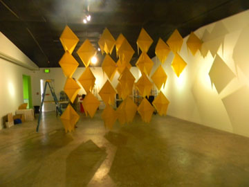 Hanging diamond shapes in the gallery