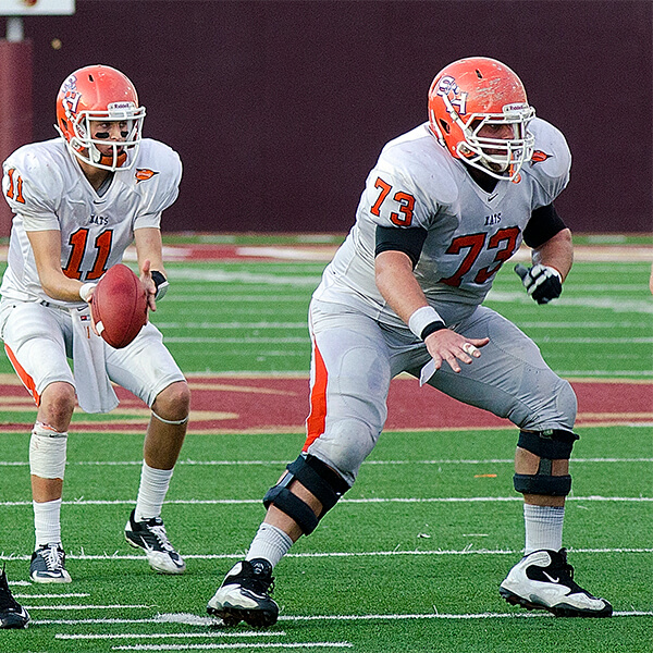 Travis Watson protecting the quarterback as center for the Bearkats in 2011.