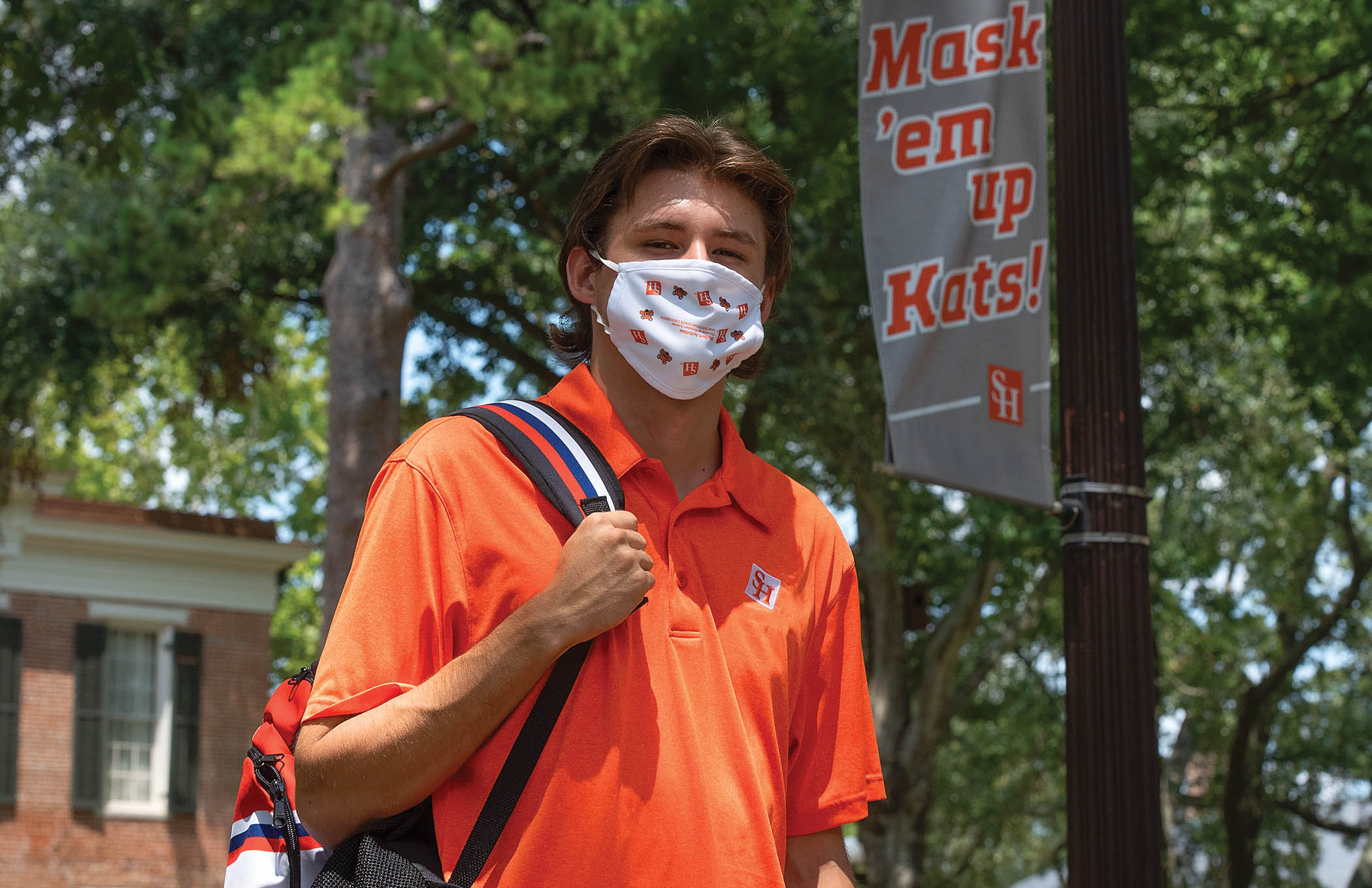 Student on campus wearing a mask