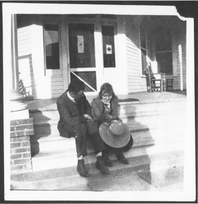 Mary Estill and friend on front step of President's Residence