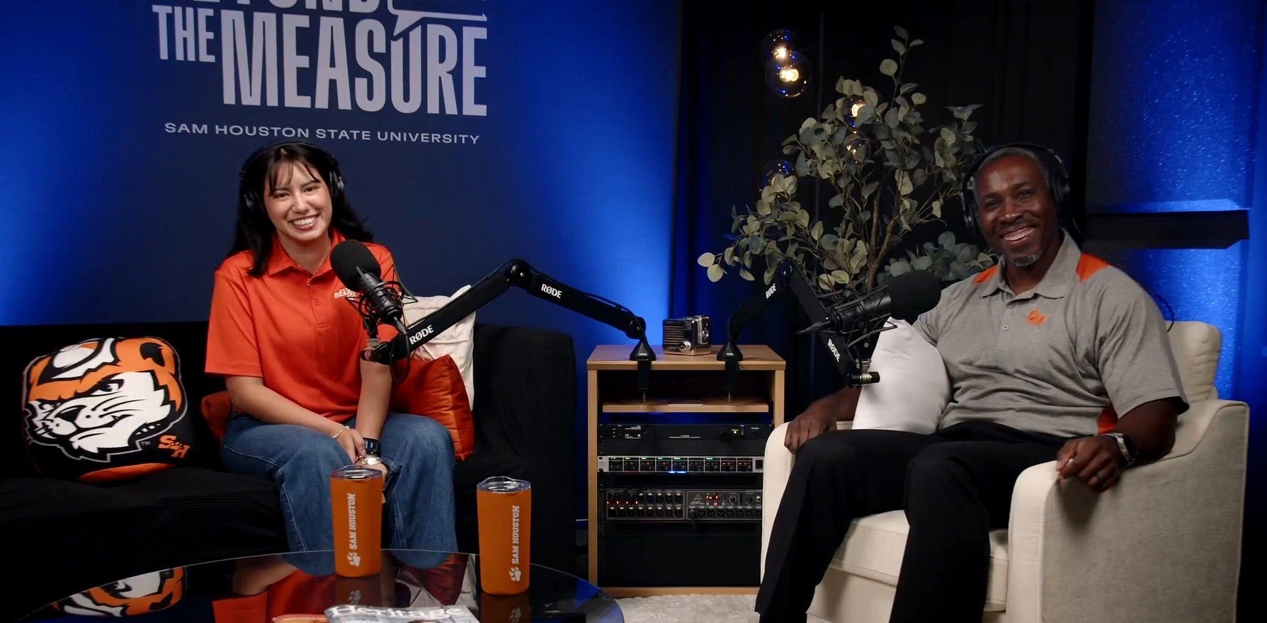 host and co host on the set of the podcast