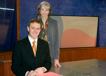 Corey Lazar at the anchor desk