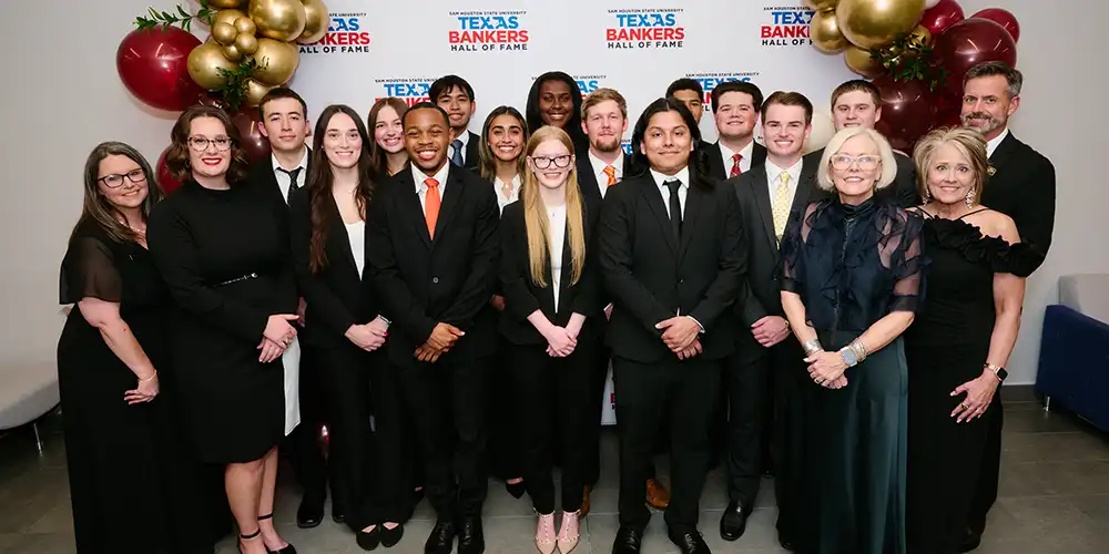 The members of the Texas Bankers Hall of Fame, posing at an event.