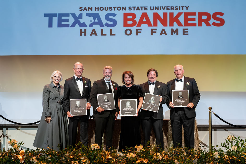 Honorees posing with their awards after the gala.