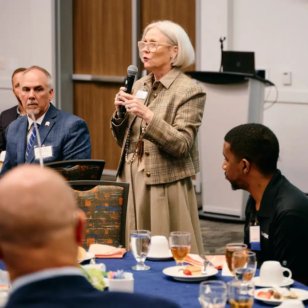 The Smith-Hutson Endowed Chair of Banking speaking at an event.