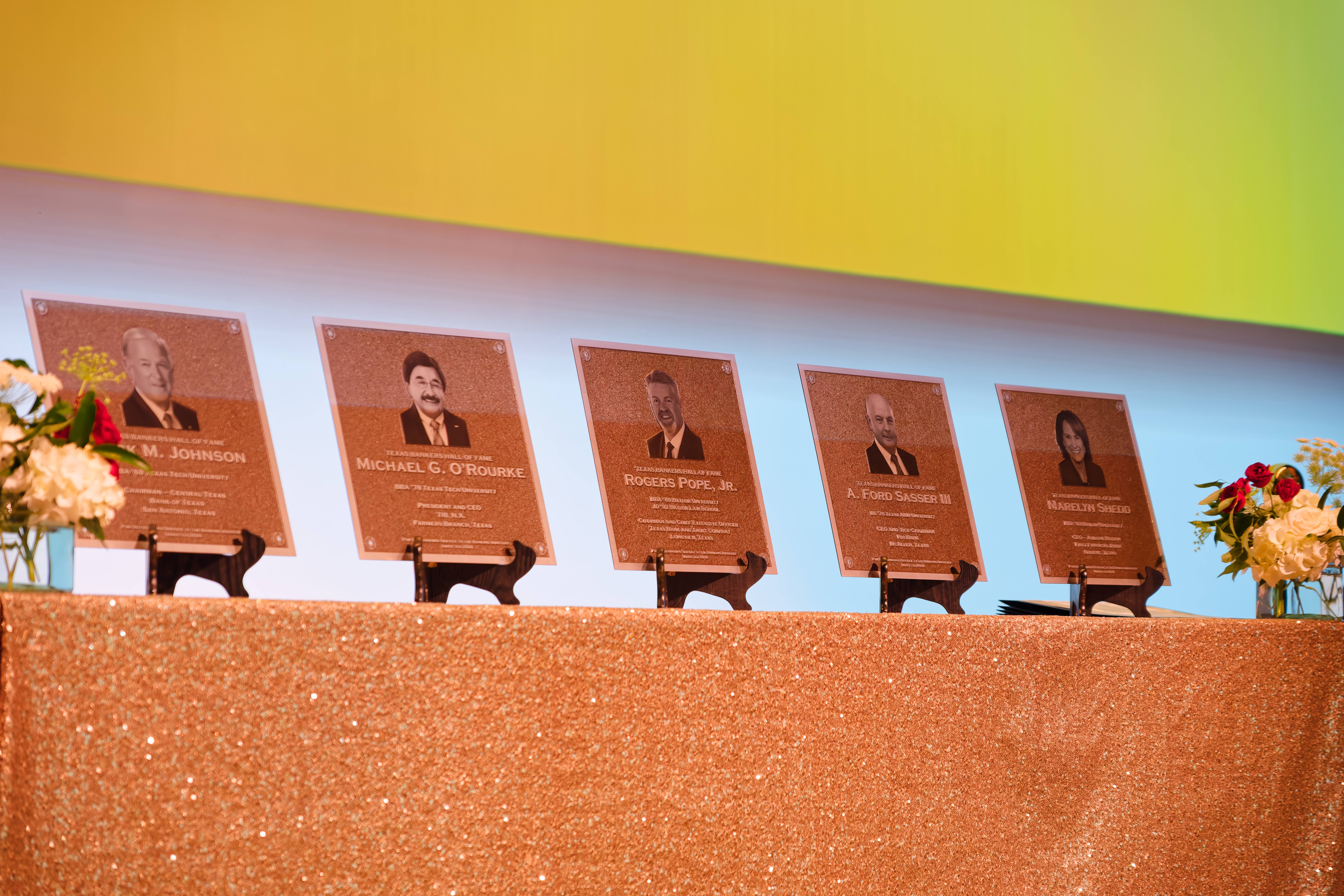 Honoree awards for the gala on a stand during the event.