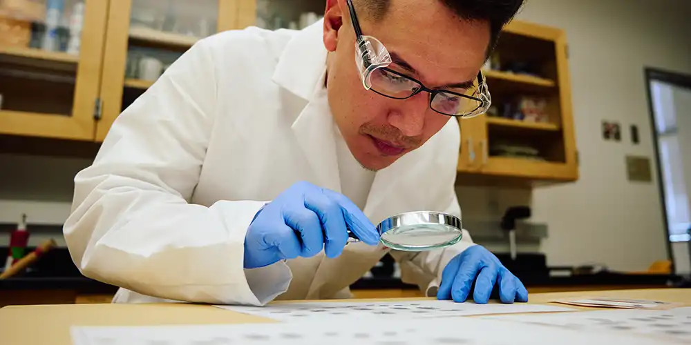 Graduate student engaged in classroom discussion