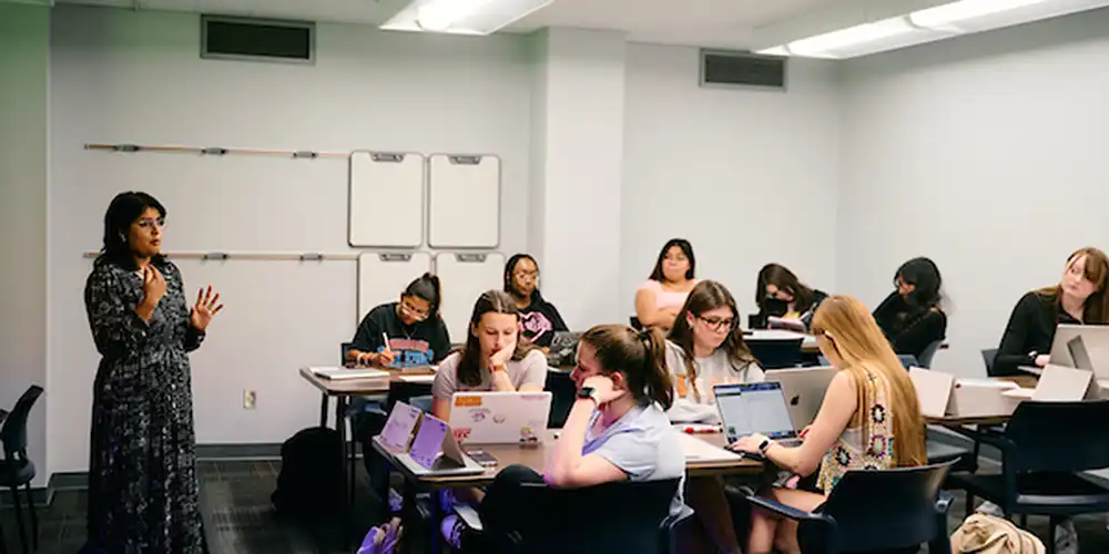 CJ and Criminology Professor teaching classroom full of students.