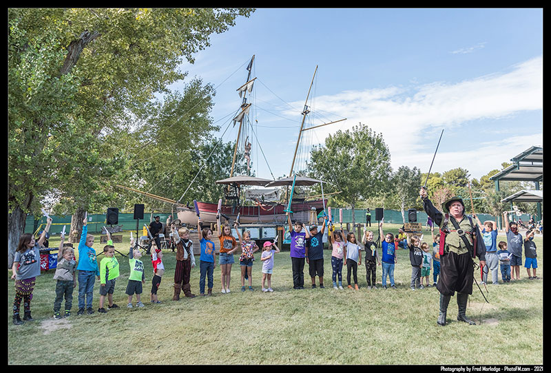 students and staff celebrate at a school renaissance festival