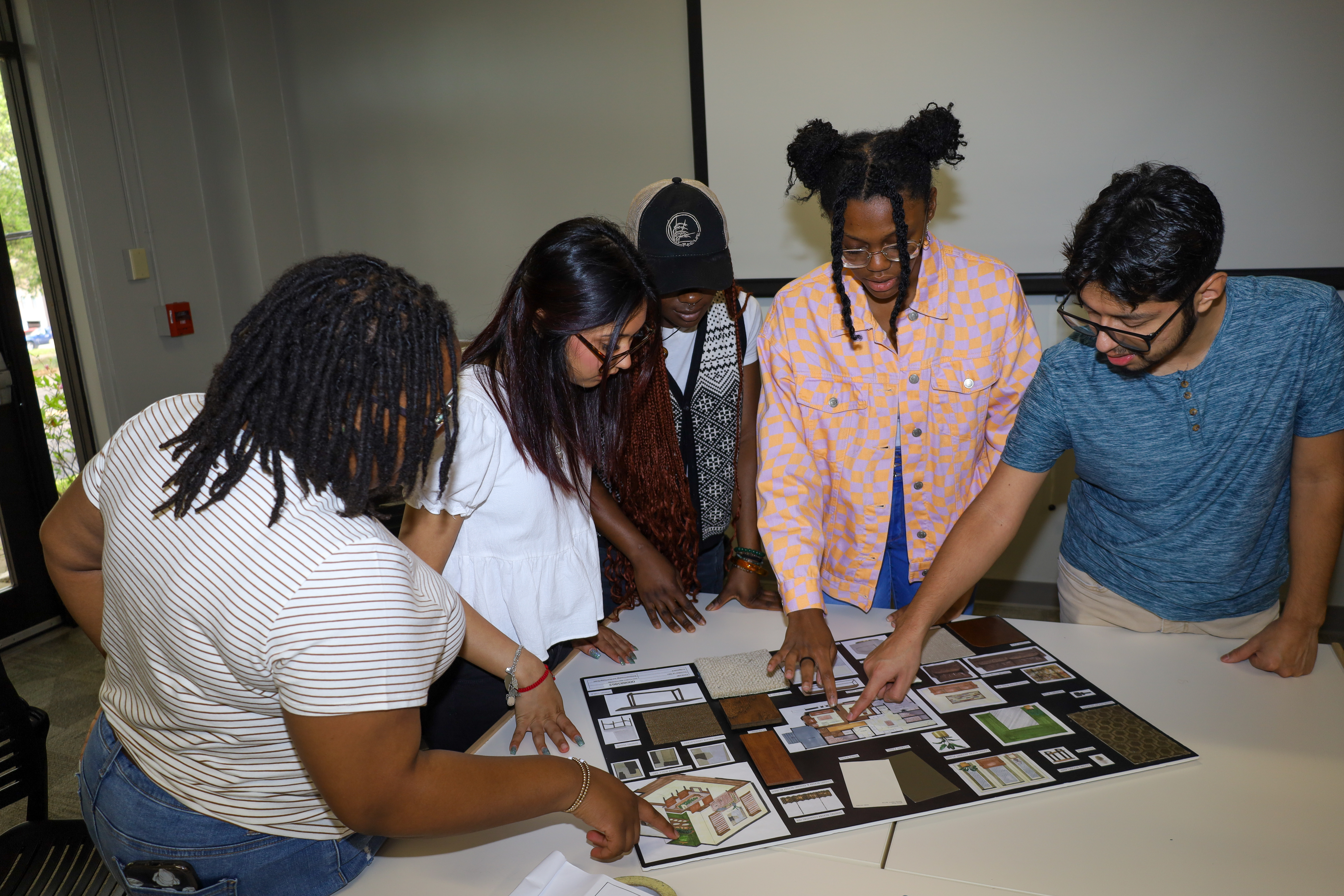 Man in suit talking to another man