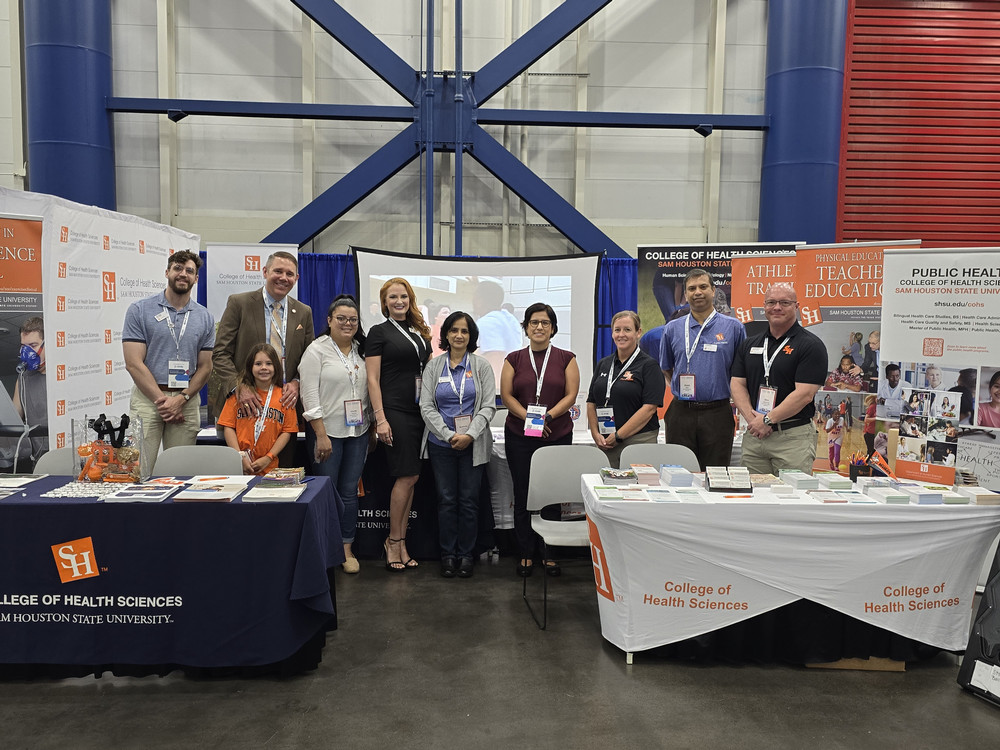Man in suit talking to another man