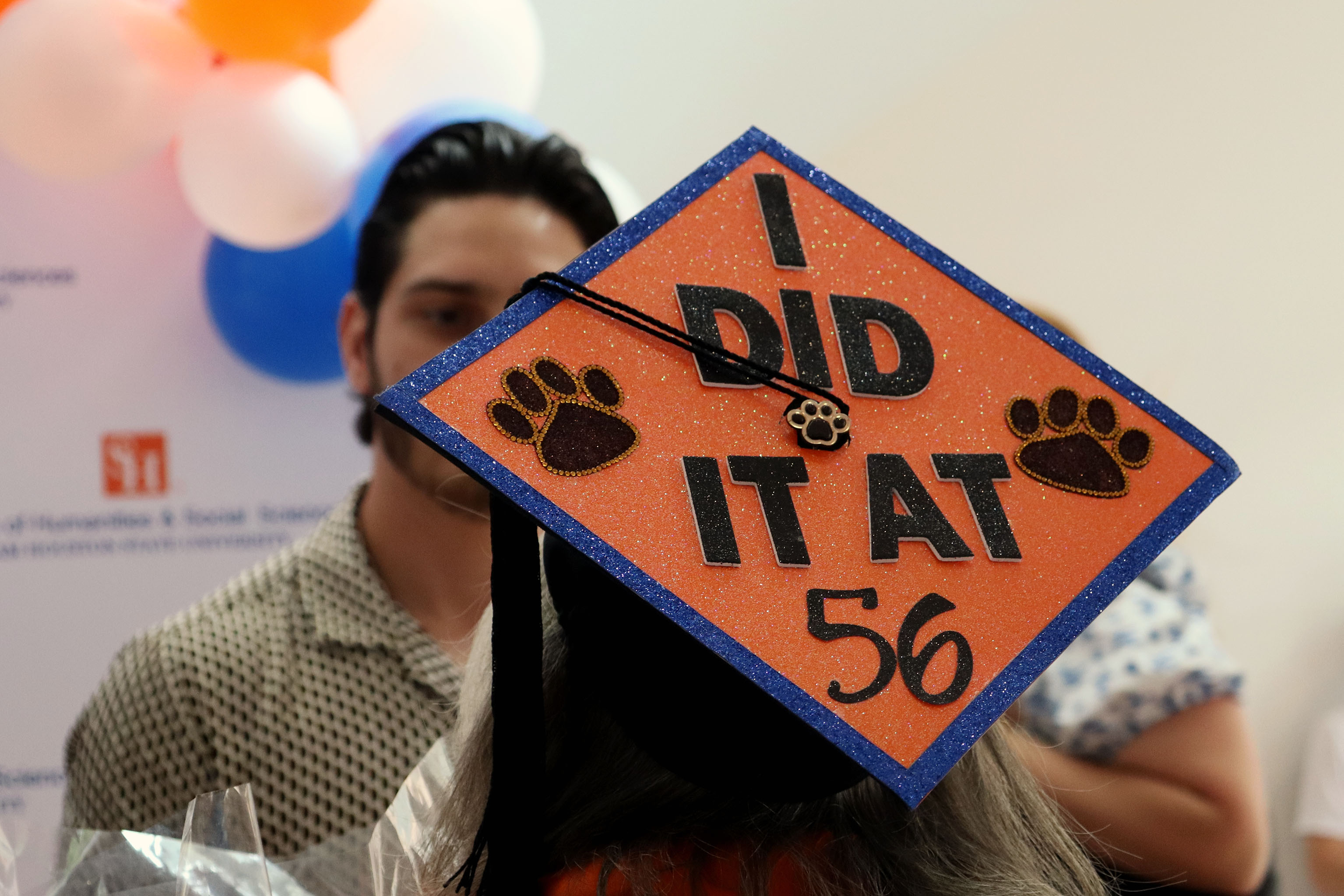 students chat at an event on campus