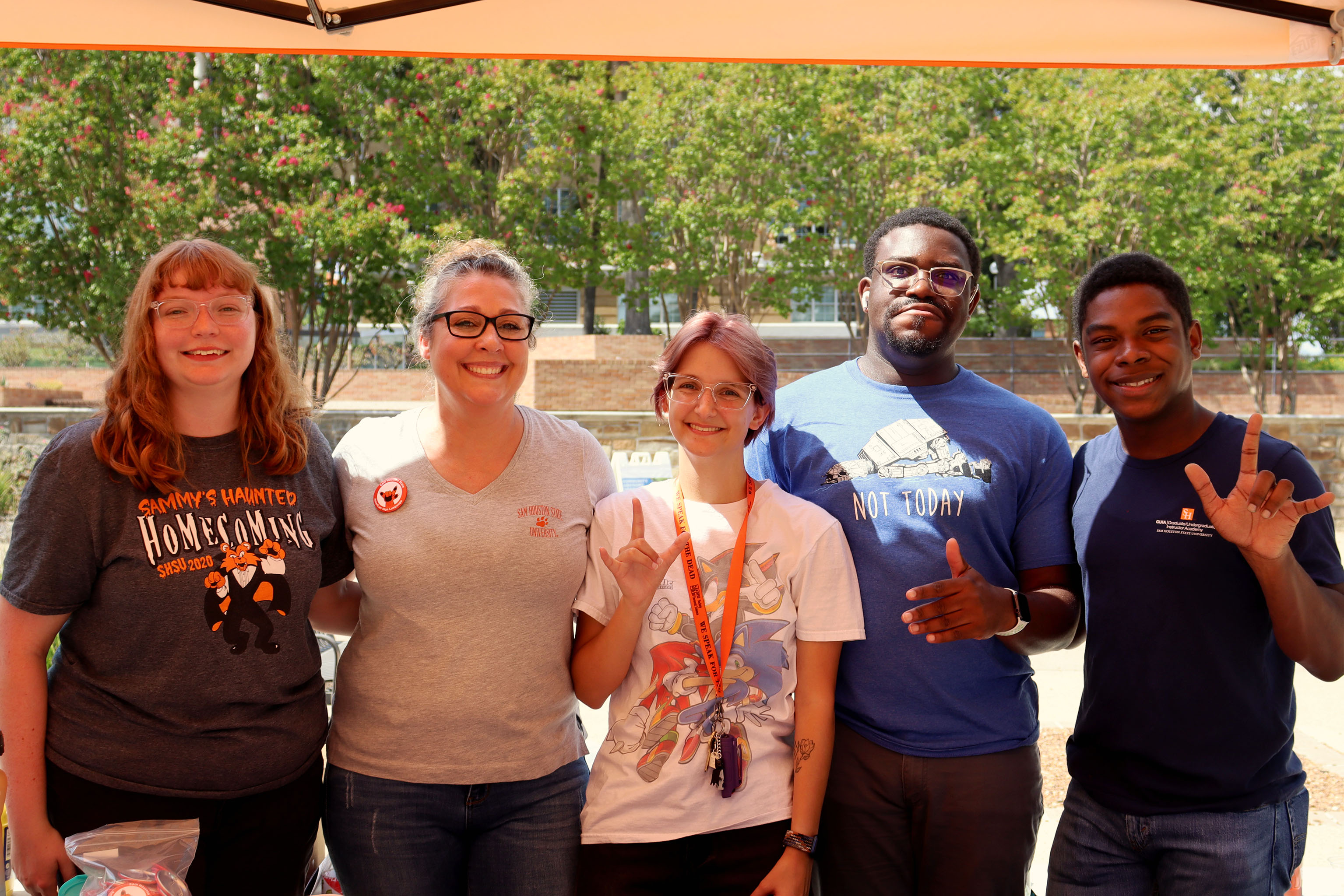 SHSU students sit in the Lowman Student Center discussing homework and studying.
