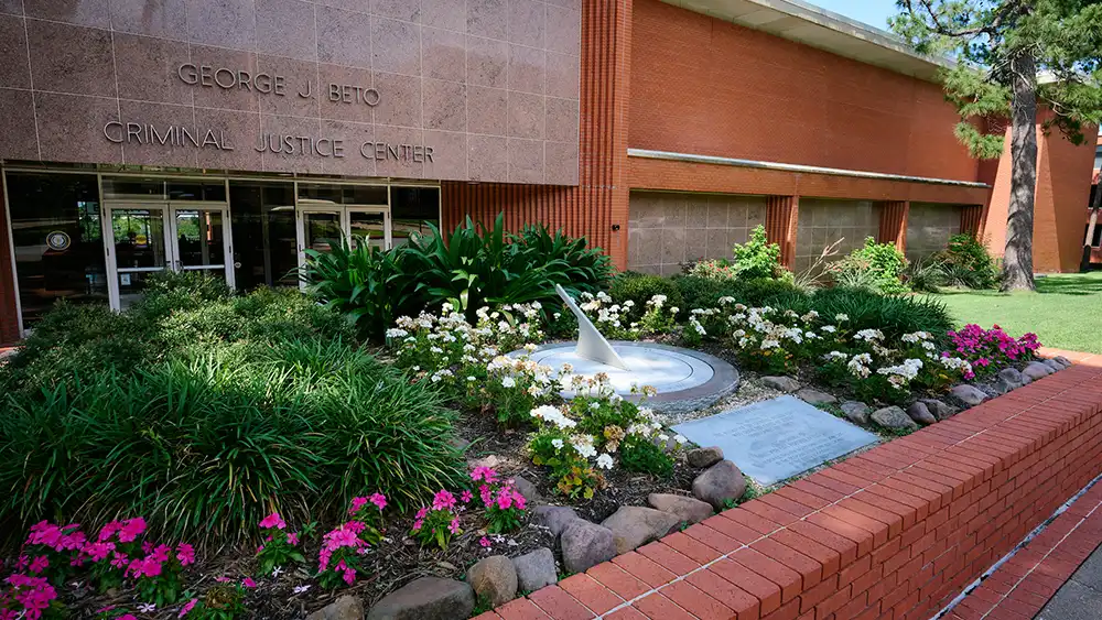 Students walking inside the art gallery.