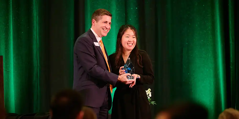 student doctor receiving an award from dean mohr