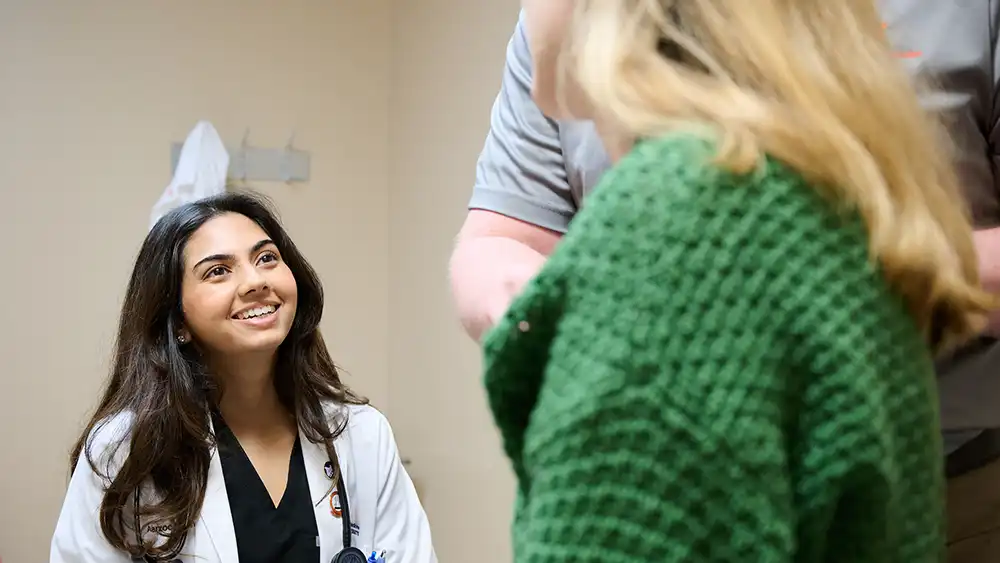 student doctor with patient