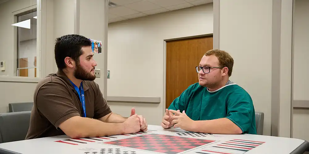 Residents with a patient at HMH family medicine residency