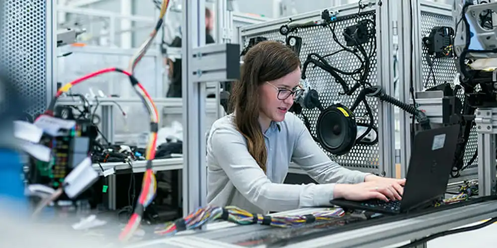 Student in lab using a laptop