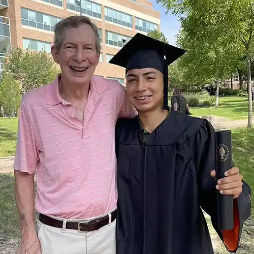 ​​SHSU Award recipient with Chuck Caughey at Graduation​ 