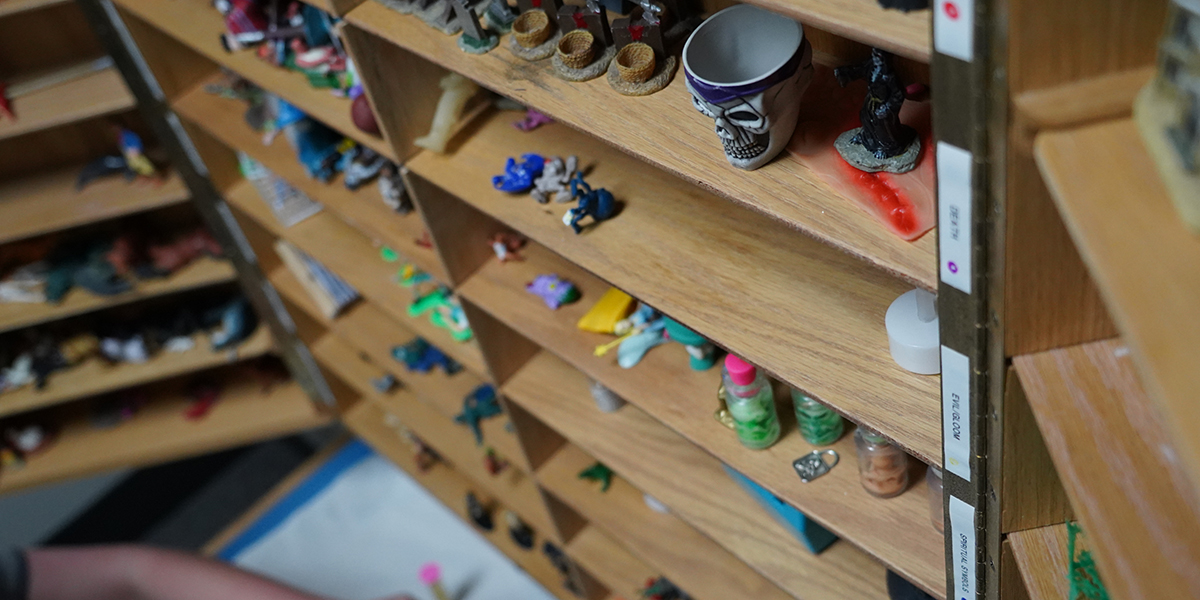 a shelf full of toys