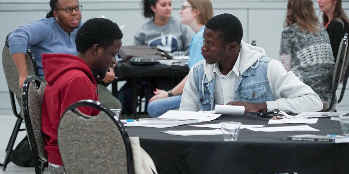Conference attendees having discussions