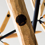 Detail of sculptor James Surl's Arround the Flower Wall, a hanging mobile of several radially arranged carved wooden paddles