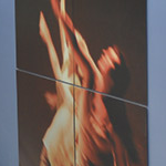 Three large photographs of dancers on the stage, by photographer Rebecca Finley