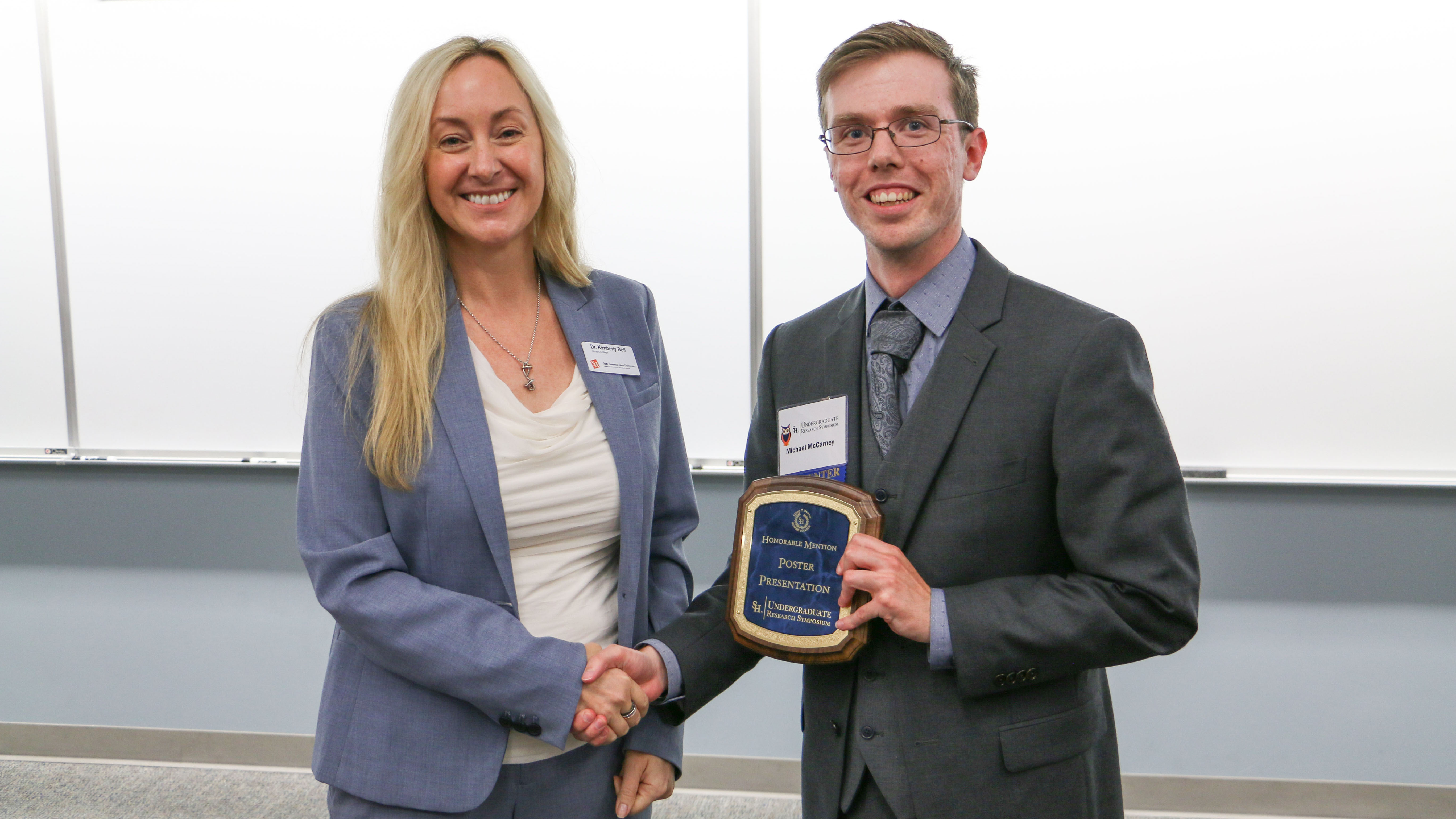 Dr. Kimberly Bell with Honorable Mention Recipient, Michael McCarney