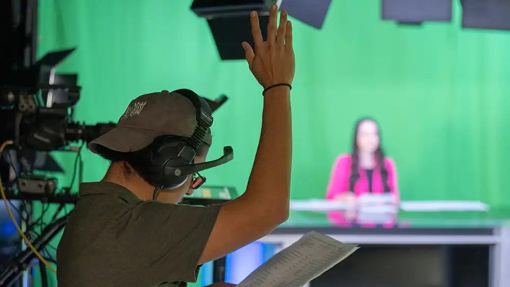 Student at Broadcast Booth