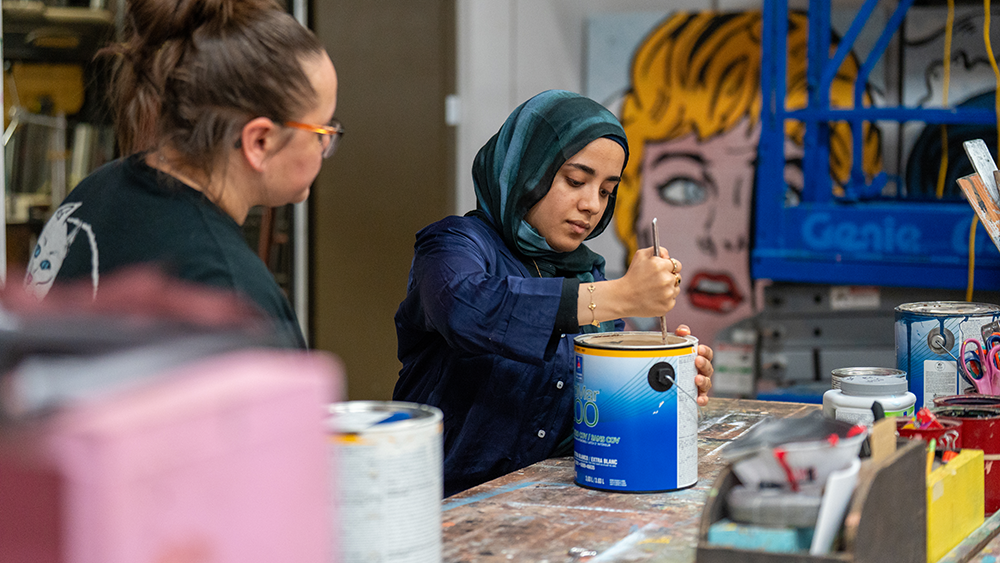 group of students on stage in performance