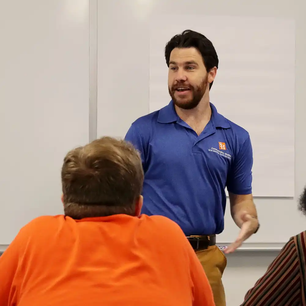 Professor teaching students.