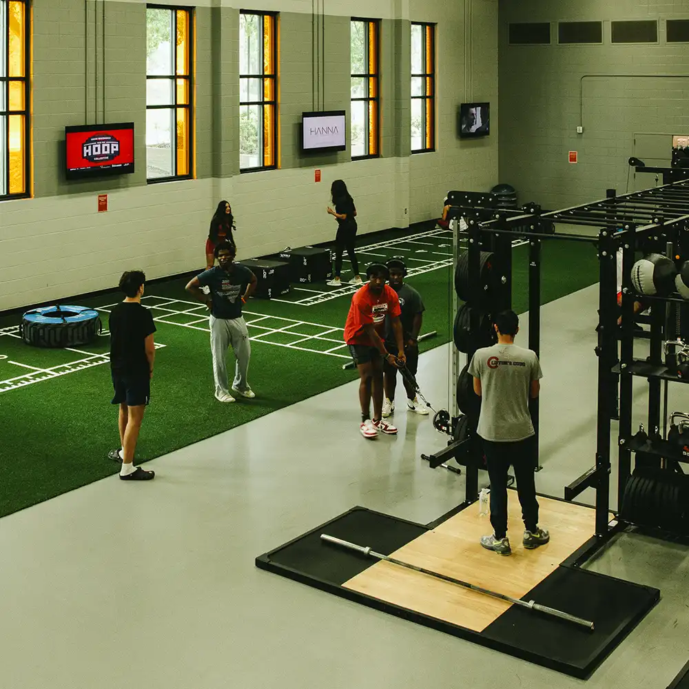 Students engage in activities in the recreational center.
