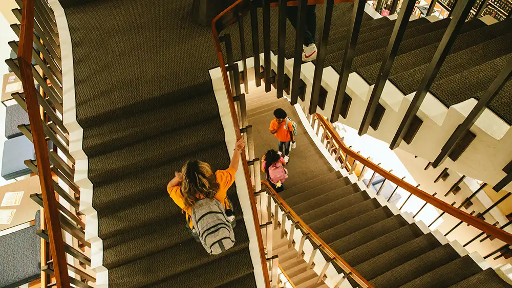 Man in suit talking to another man