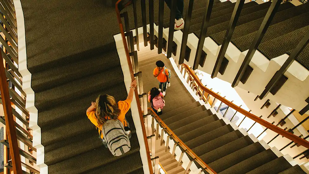 Man in suit talking to another man