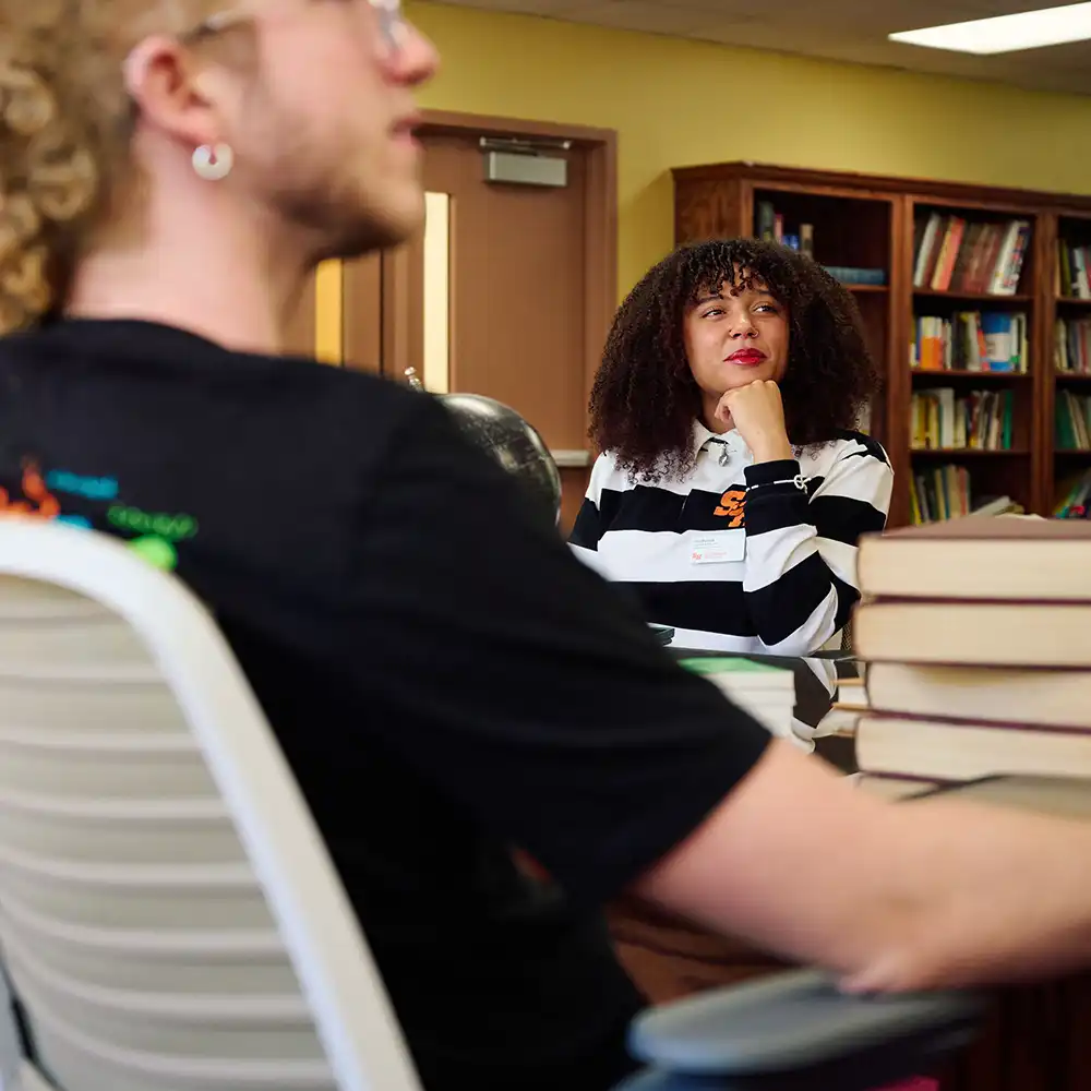Students listen intently during presentation