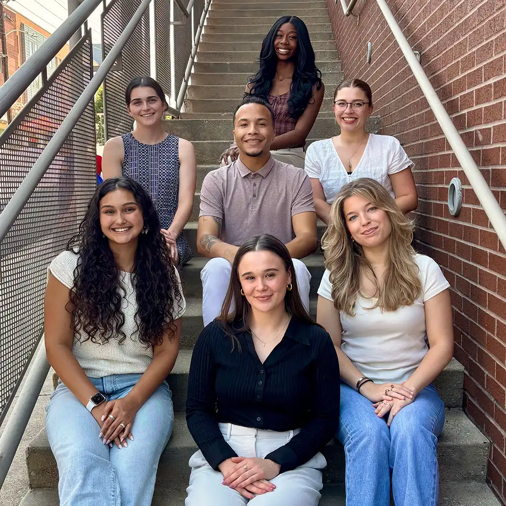 Group photo of the 2025 Clinical Psychology PhD Cohort, made up of seven students. 