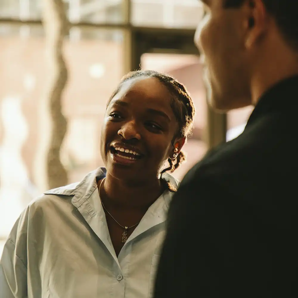 SHSU students engage in lively conversation.