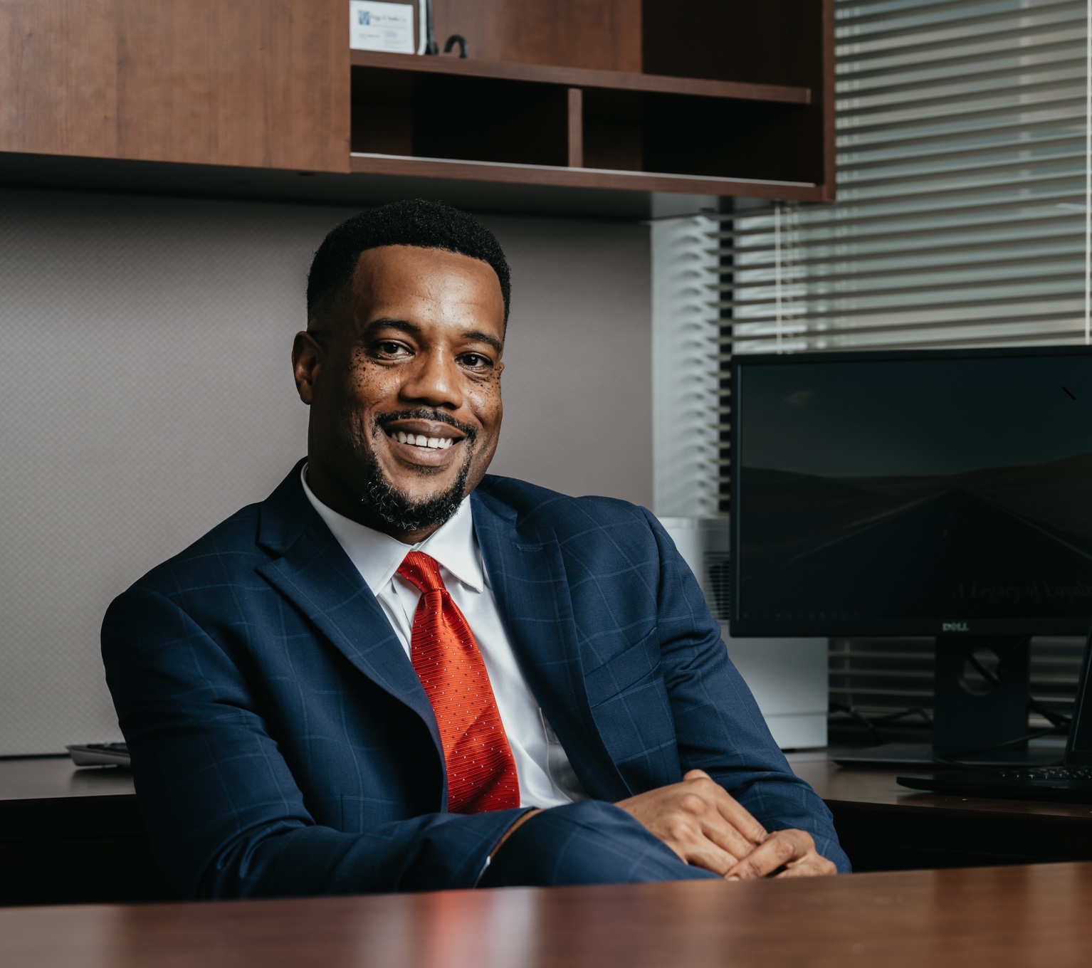 Business Professional Smiling at desk