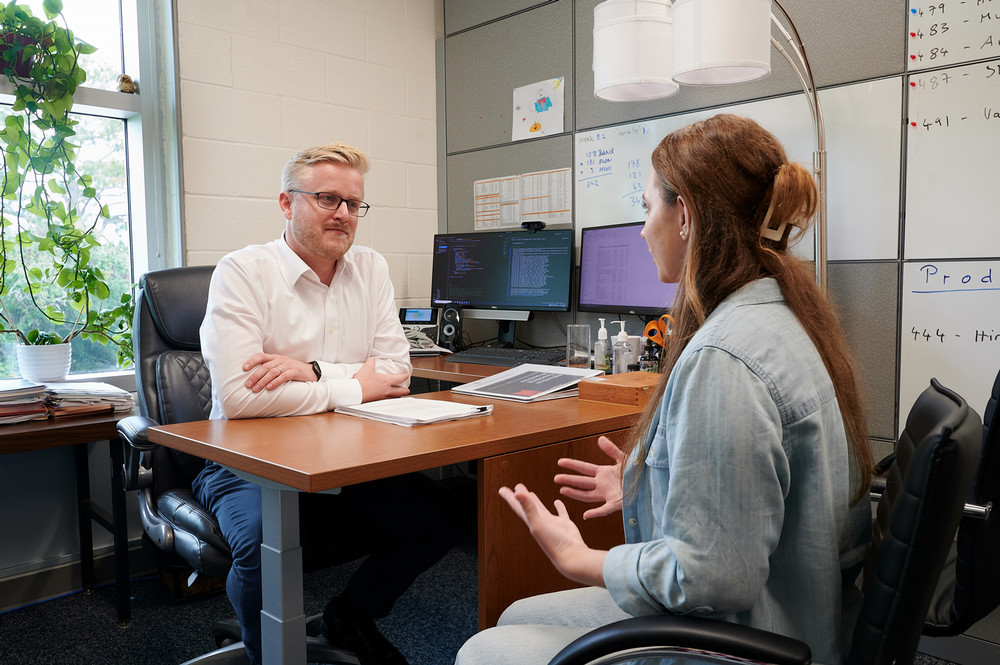 Economics professor advising students