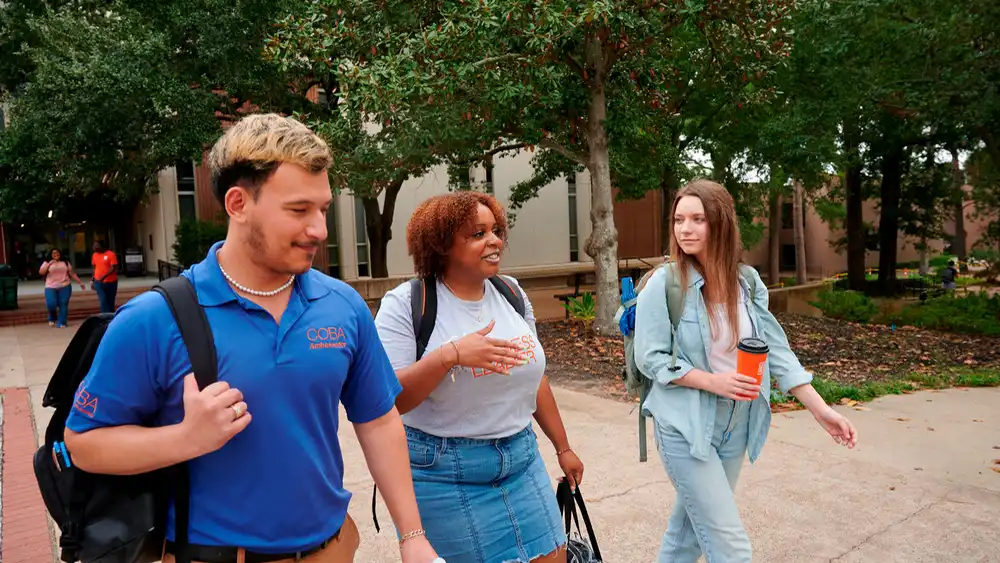Students walking across campus.