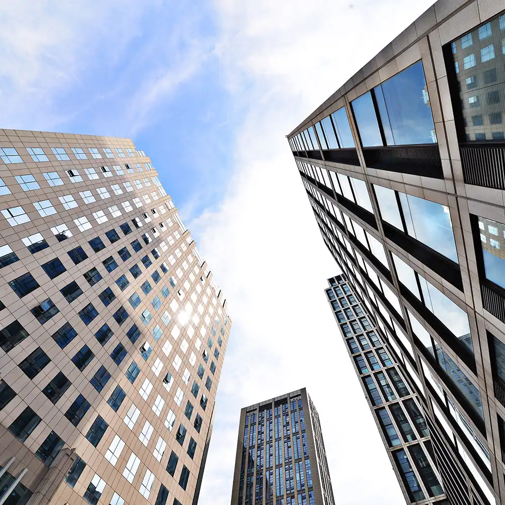Image of skyscrapers taken from below.