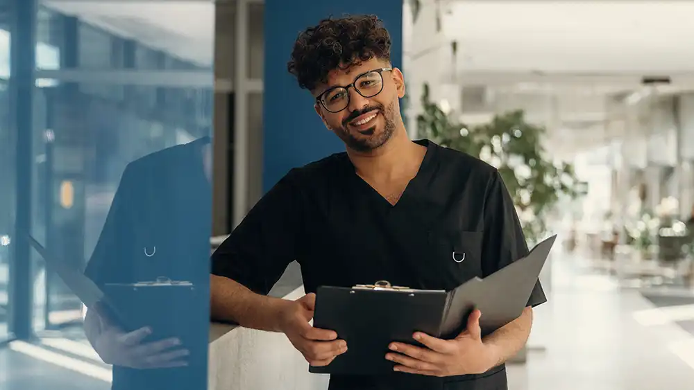 Man in suit talking to another man