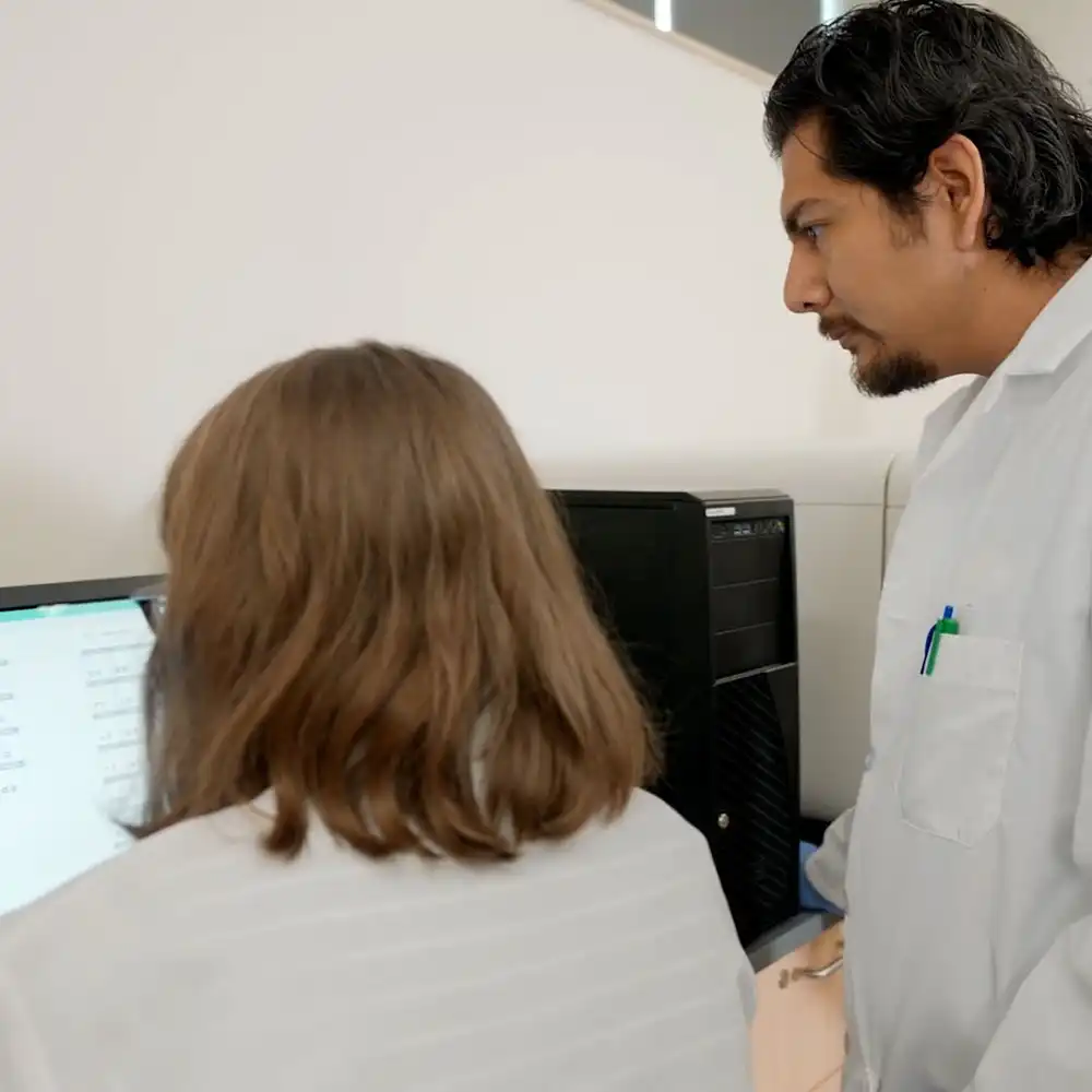 Student and Teacher working in a Lab