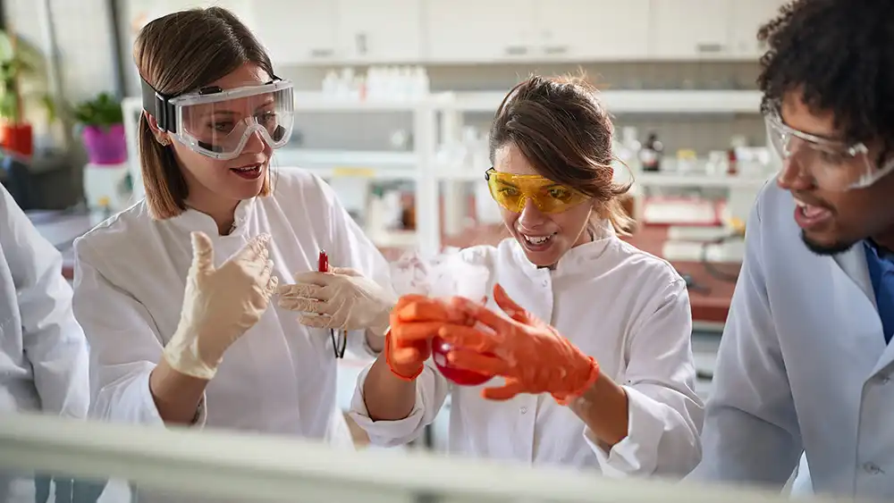 Man in suit talking to another man
