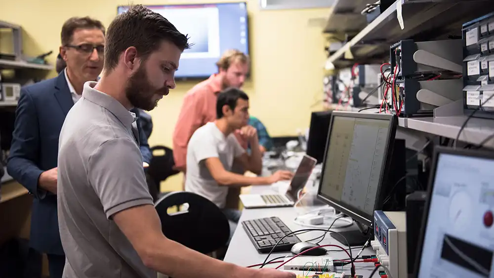 Professor speaking to class.
